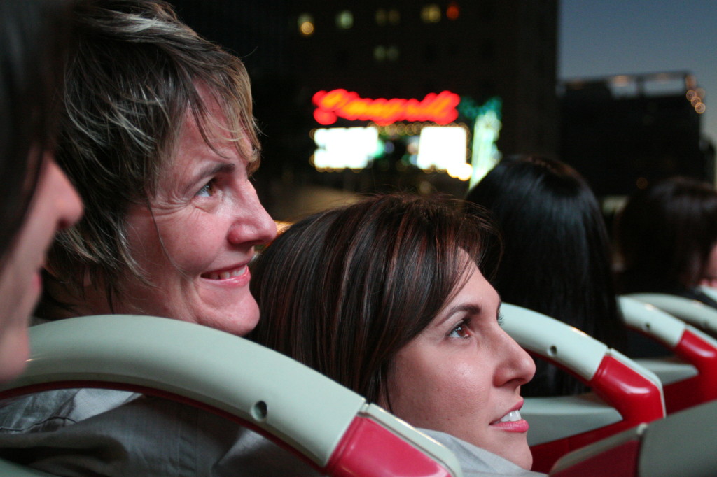 helen's friends watching the lights of hollywood blvd. disappear behind us
