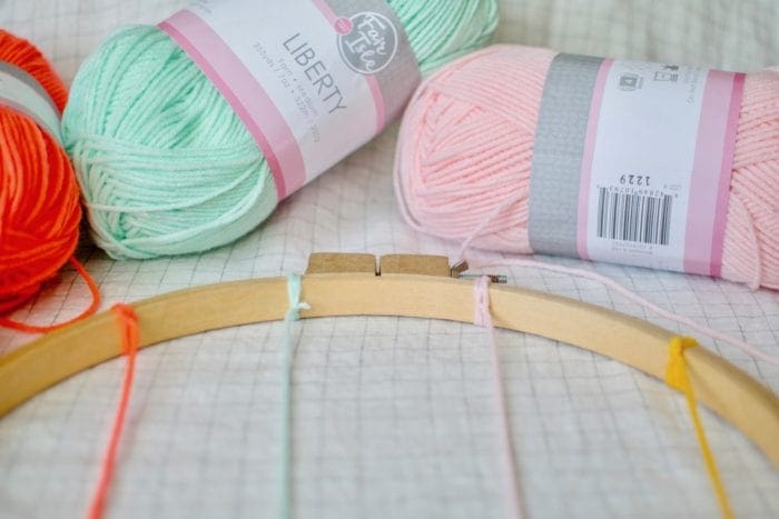 DIY tasseled instax photo Wall Hanger from Dear Handmade Life