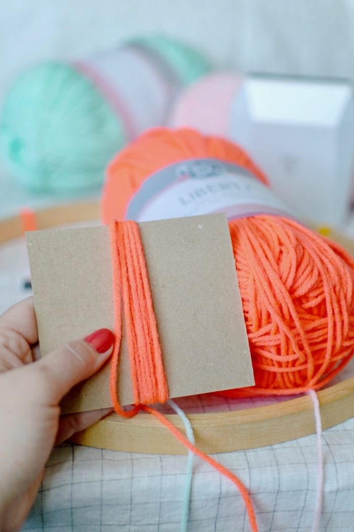 DIY tasseled instax photo Wall Hanger from Dear Handmade Life