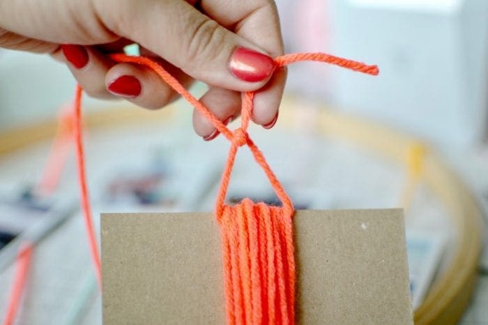 DIY tasseled instax photo Wall Hanger from Dear Handmade Life