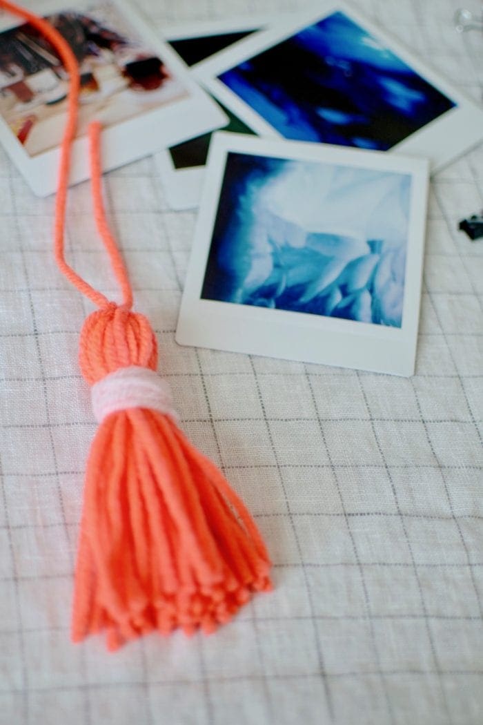 DIY tasseled instax photo Wall Hanger from Dear Handmade Life