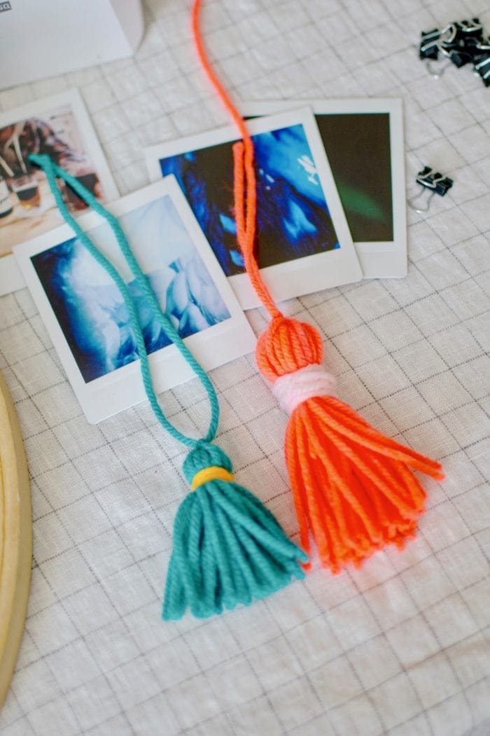 DIY tasseled instax photo Wall Hanger from Dear Handmade Life