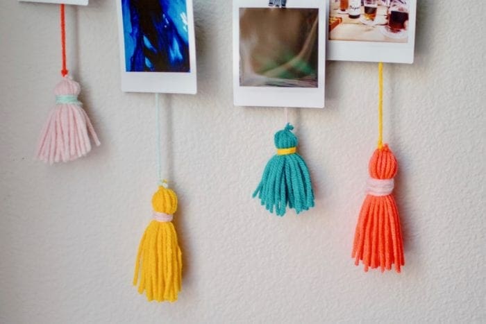 DIY tasseled instax photo Wall Hanger from Dear Handmade Life