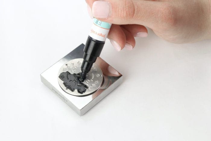 DIY Metal Stamped Mandala Tassel Necklace from Dear Handmade Life