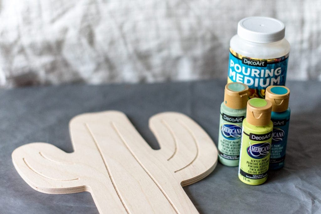 DIY paint pouring on wood shapes from Dear handmade Life