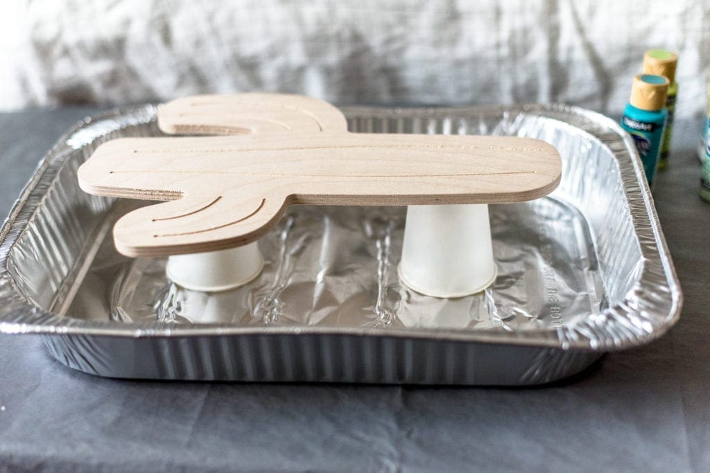 DIY paint pouring on wood shapes from Dear handmade Life