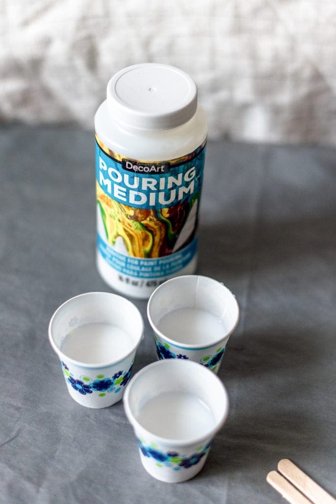 DIY paint pouring on wood shapes from Dear handmade Life