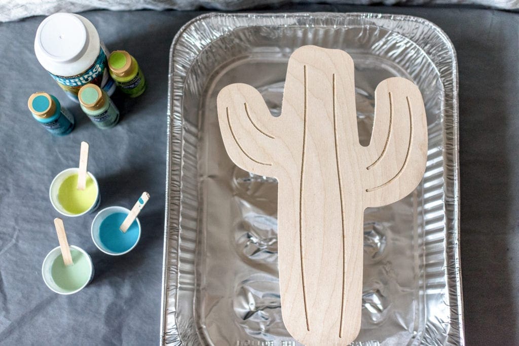 DIY paint pouring on wood shapes from Dear handmade Life